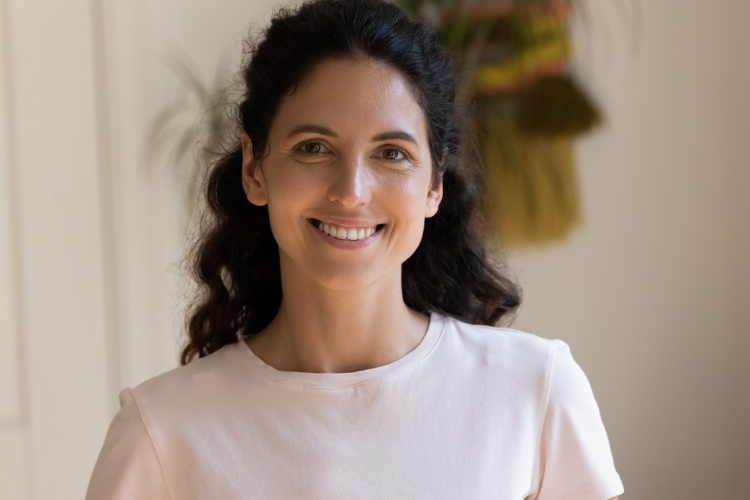 A smiling mental health counselor.